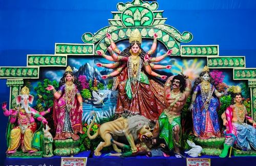 Durga Idol ornamented with gold-polished jewelries from The Golden Jewellers by Nupur